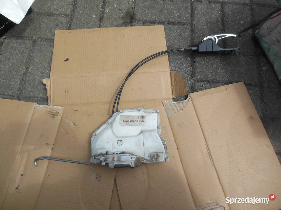 ZAMEK LEWY PRZÓD DRZWI SUZUKI SWIFT V 8220268LA0 osobowe