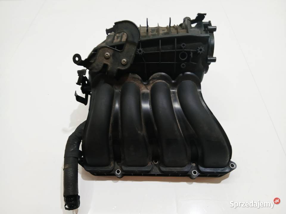 KOLEKTOR SSĄCY BMW E90 E91 N43B20A OE 7524513