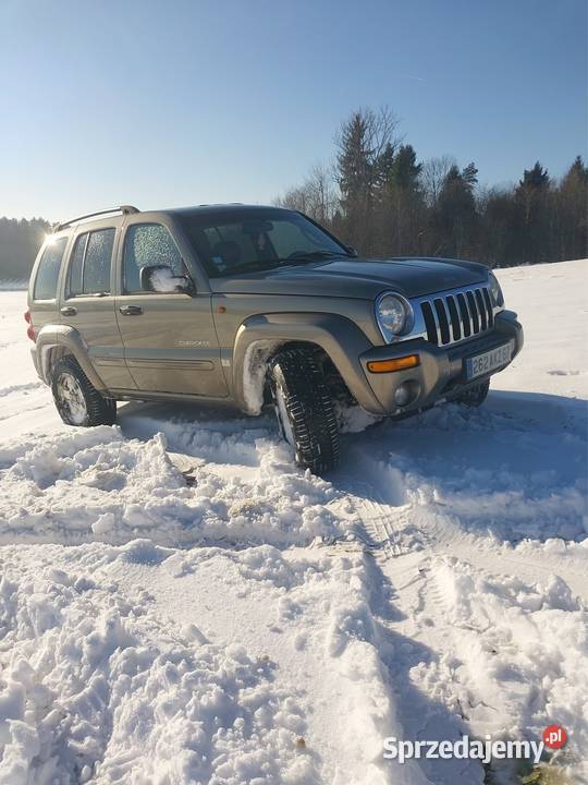 Jeep cherokee złoty