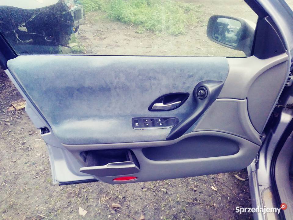 Drzwi zewnętrzne kombi Renault laguna ll części blacharskie Posługowo