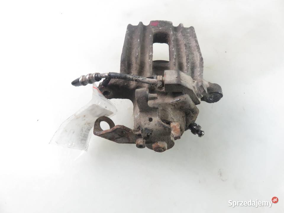 ZACISK LEWY TYŁ VW BORA