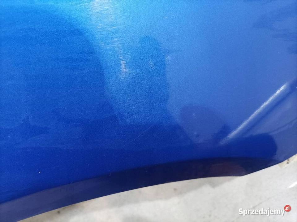 BŁOTNIK PRAWY PRZÓD D06 Mitsubishi Lancer VIII