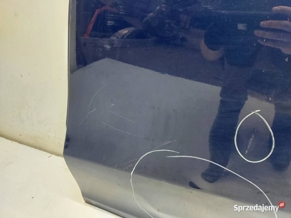 TESLA MODEL Y 2024r DRZWI LEWY TYŁ NIEBIESKI