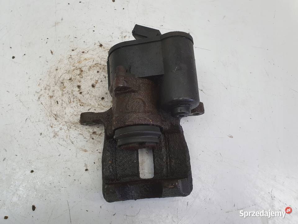 VW Passat B7 TYLNY ZACISK HAMULCOWY prawy tył Janów sprzedam