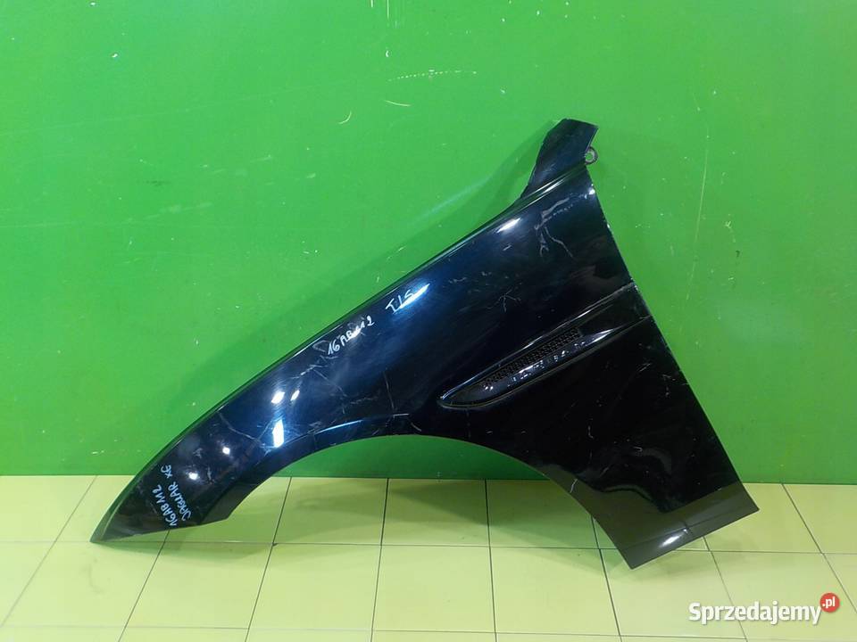 JAGUAR XE 20 D 15r SEDAN 4D blotnik lewy przod Suków