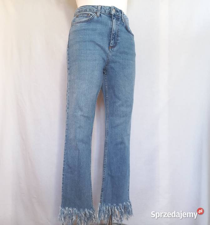 Spodnie jeans Frędzle niebieskie Pióra r 38 Topshop Moda i Styl Białystok
