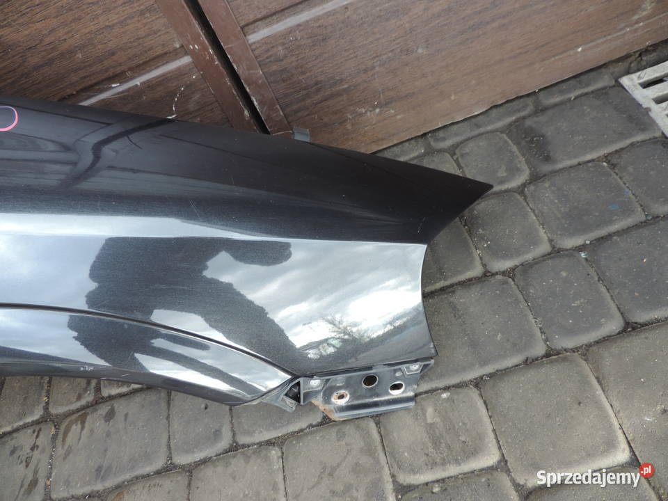 BŁOTNIK PRAWY PRZÓD OPEL ASTRA 2 G Z298 Błotniki małopolskie