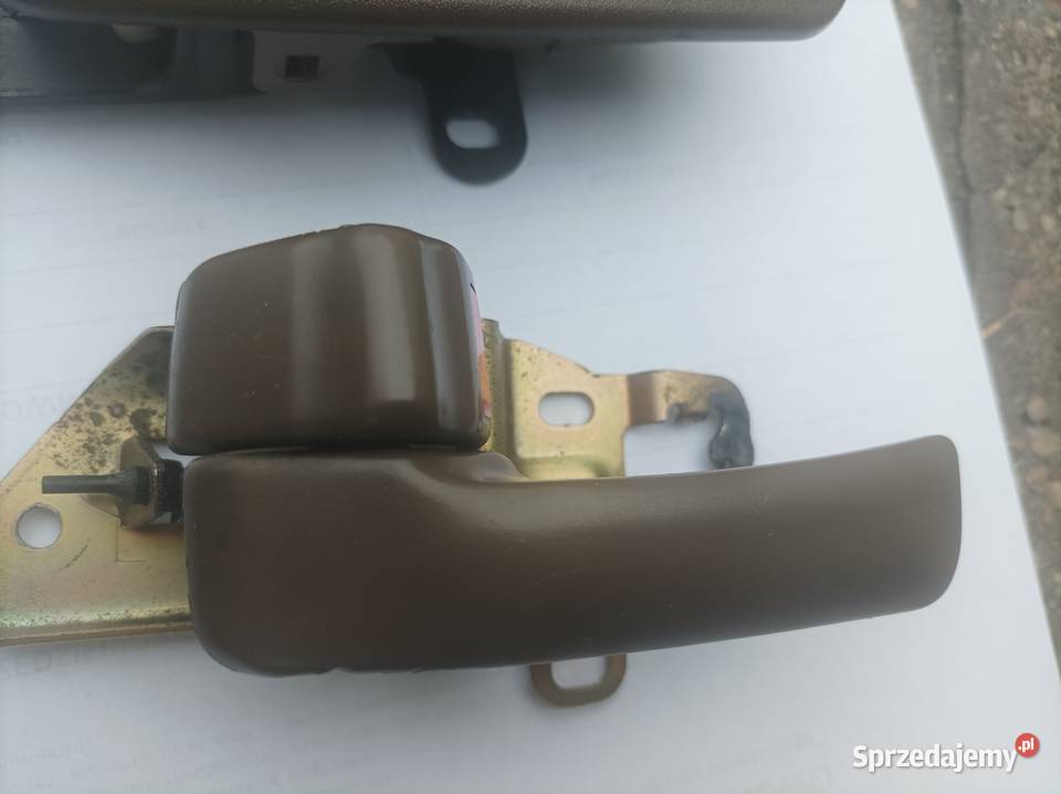 Klamka wewnętrzna Toyota Camry 9195r bezowa Części samochodowe wielkopolskie Konin