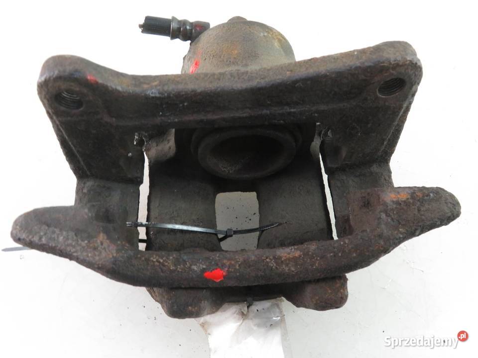 ZACISK LEWY PRZÓD TOYOTA COROLLA Verso 20 D4D