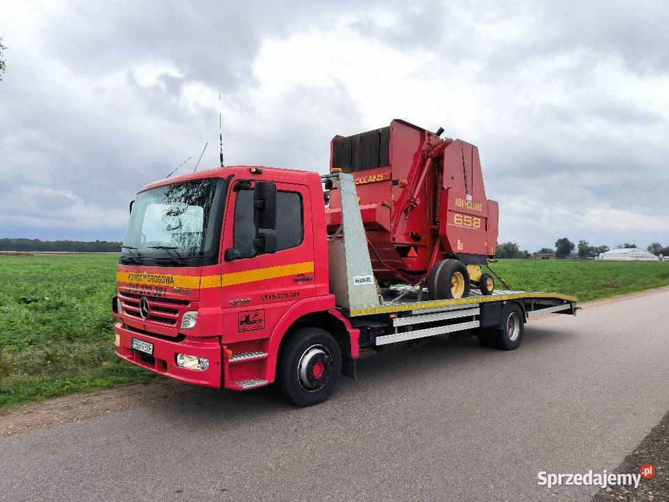 Pomoc drogowa Autolaweta Laweta Transport Maszyn Pomoc drogowa i holowanie łódzkie Łódź