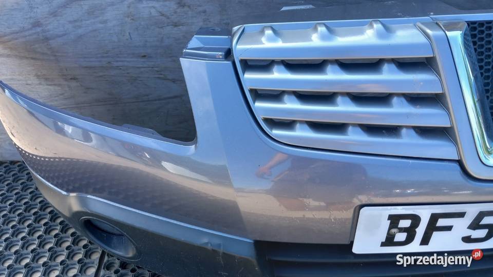 NISSAN QASHQAI J10 ZDERZAK PRZÓD B52G HALOGEN Zbierkowo