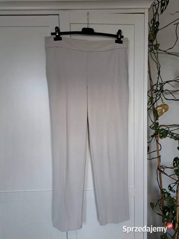 Beżowe eleganckie spodnie Maison dAmlie Paris EU Trąbki Wielkie