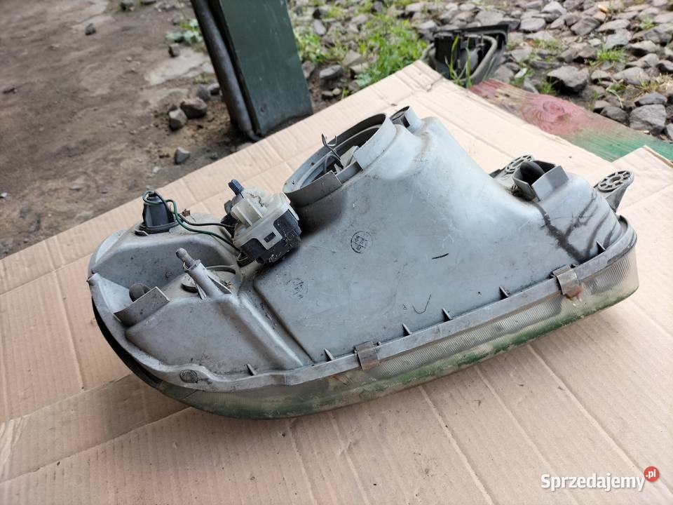 KIA CARNIVAL LAMPA PRZÓD LEWA Kamień-Kolonia