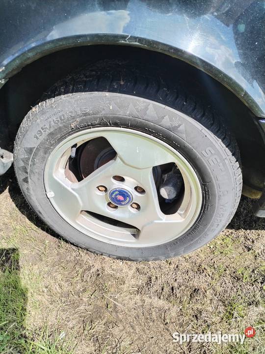 Alufelgi z oponami saab 1956015 Samochodowe Chęciny sprzedam