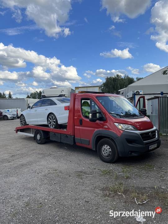 pomoc drogowa auto laweta transport maszyn Pomoc drogowa i holowanie mazowieckie Kołbiel usługa
