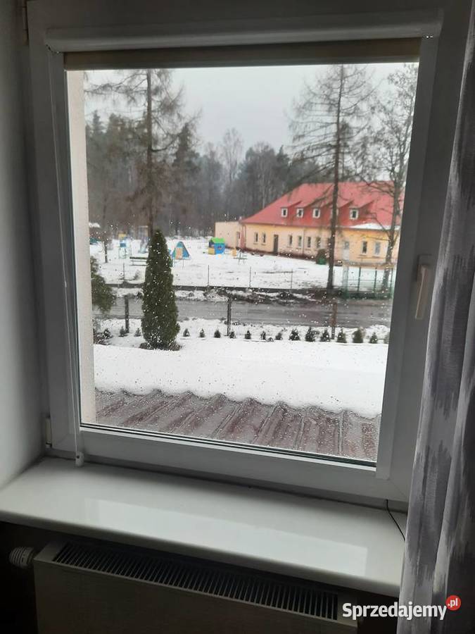 Okna PCV kompletne z roletamiparapetami 119cm Budownictwo i akcesoria Czarna Woda