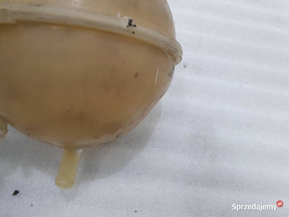 ZBIORNICZEK WYRÓWNAWCZY VOLKSWAGEN T4 701121407B osobowe