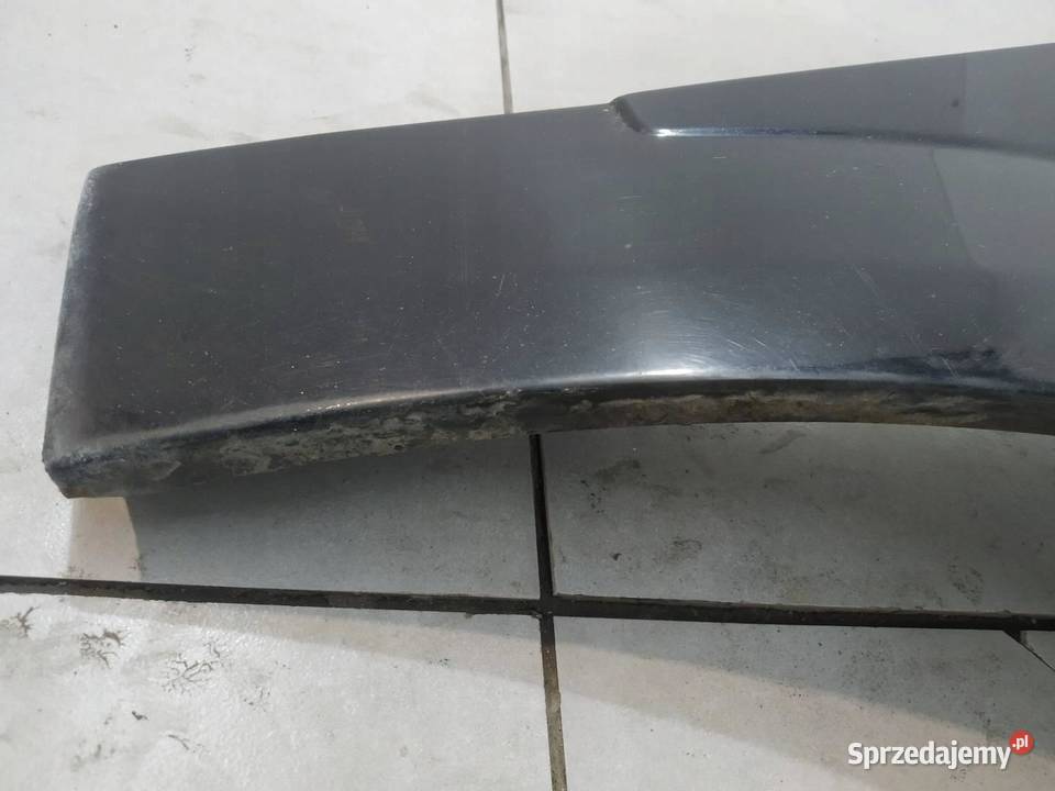 BŁOTNIK PRAWY PRZÓD CZARNY Opel Astra III
