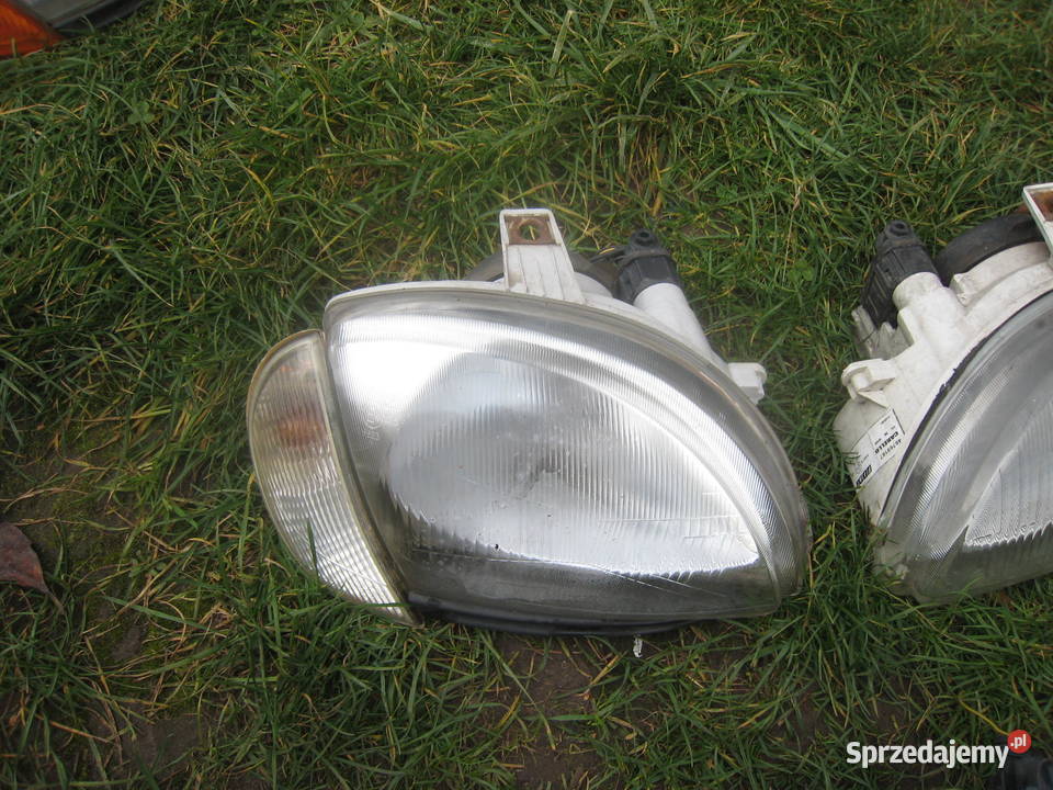 Lampa przednia reflektor Fiat Seicento 600 biały Osłony i zaślepki Kraków