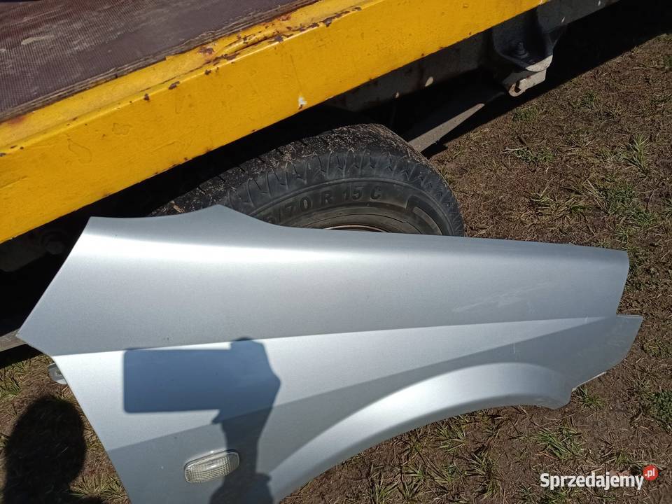 błotnik prawy nissan primera P12 KLO G Szczecin