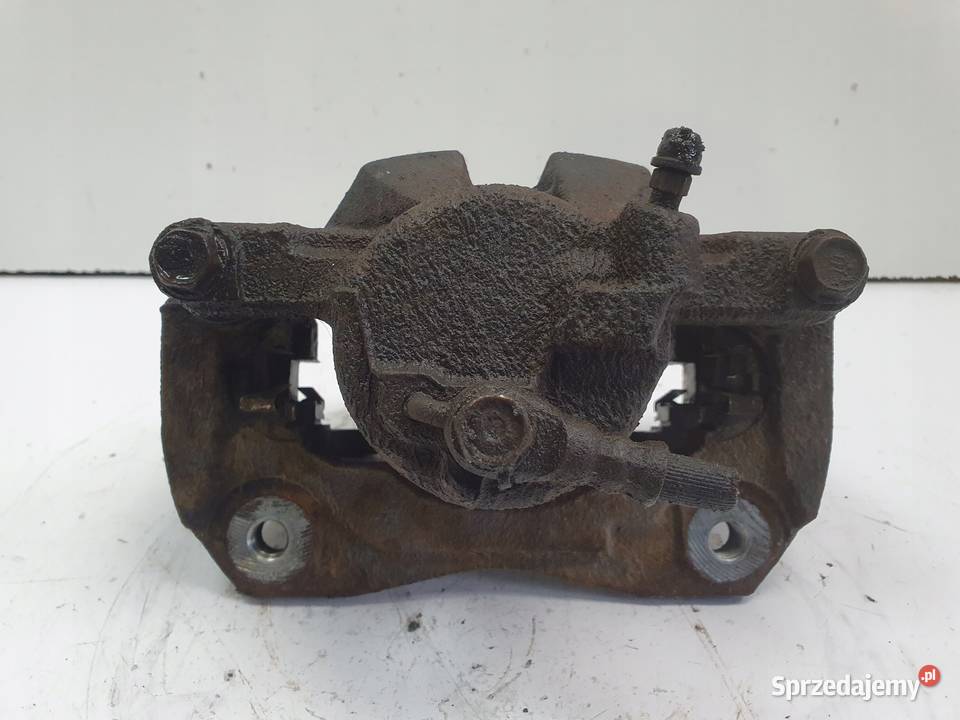 Toyota Camry VI PRAWY PRZEDNI ZACISK HAMULCOWY