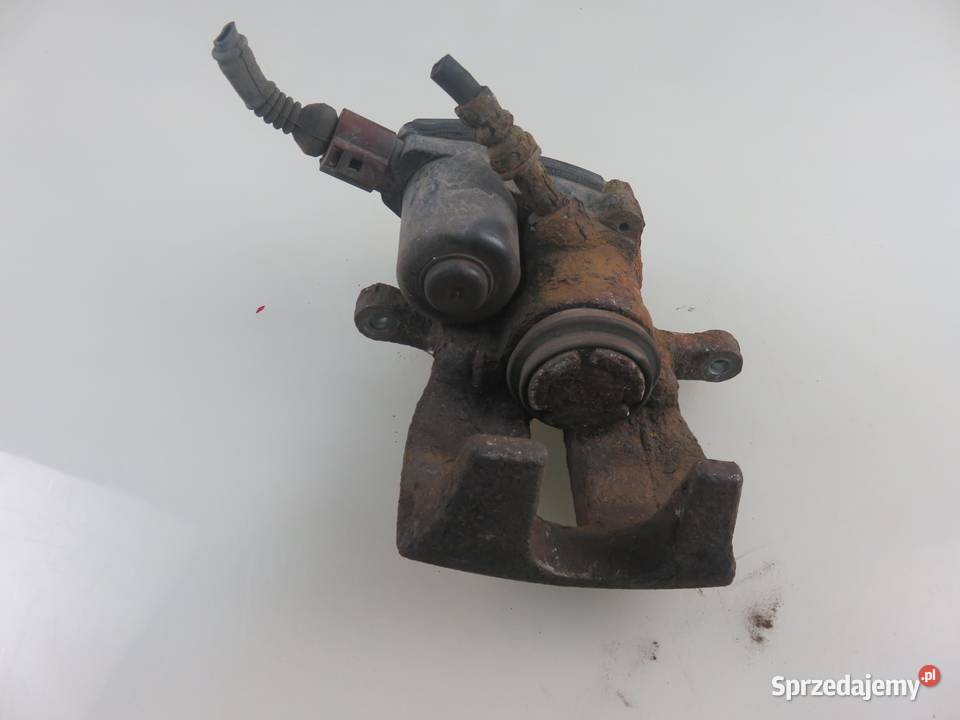 ZACISK LEWY TYŁ AUDI A4 B8 18 TFSI osobowe