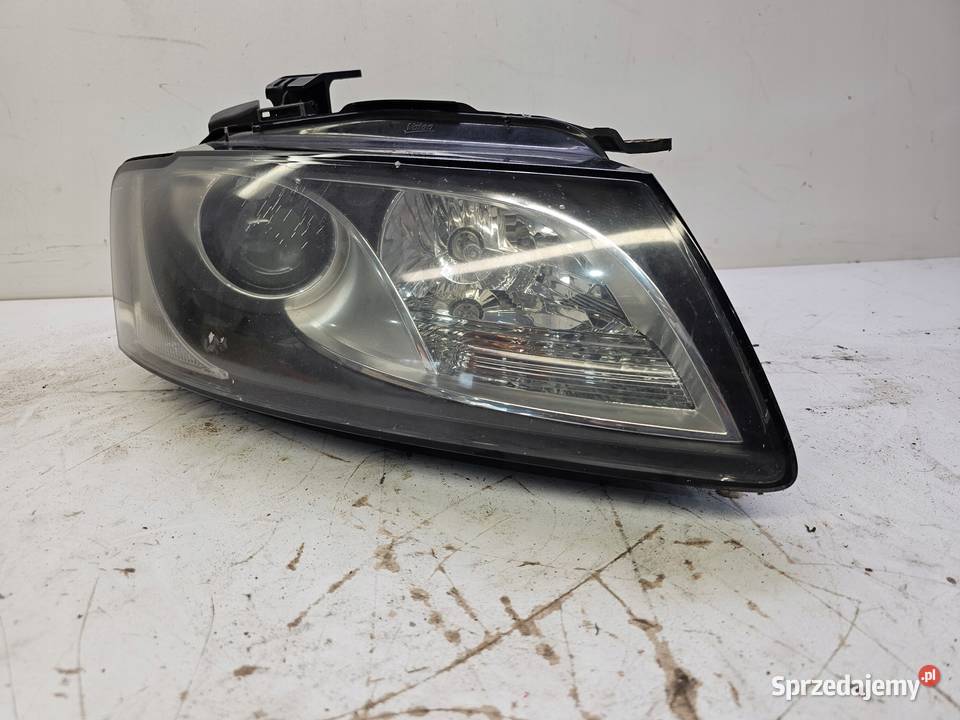 REFLEKTOR PRAWY PRZÓD AUDI A5 8T0941004AB osobowe Części samochodowe Przystajń