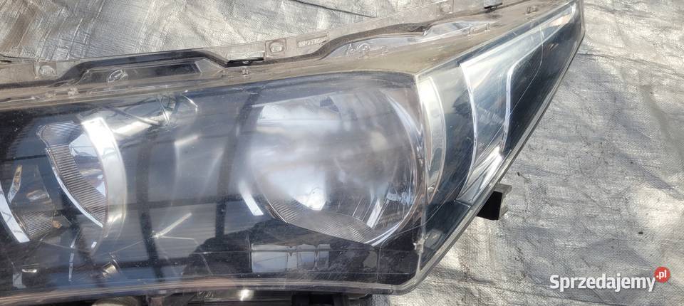 REFLEKTOR LAMPA LEWY PRZÓD TOYOTA COROLLA E16