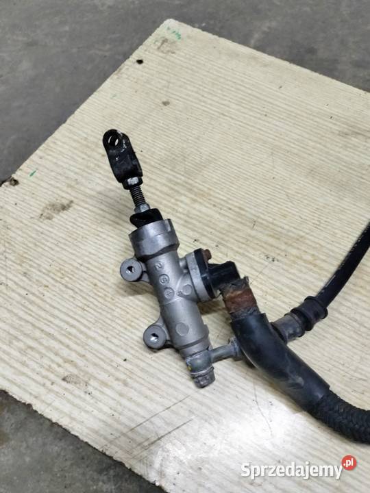 Zacisk hamulca tył pompa zbiorniczek wyrównawczy Łubno