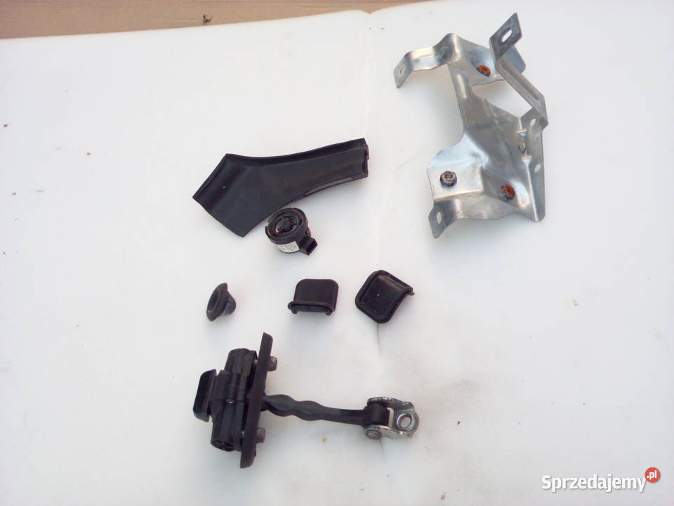 Fiat Doblo II Opel Combo ogranicznik drzwi lewe Turek