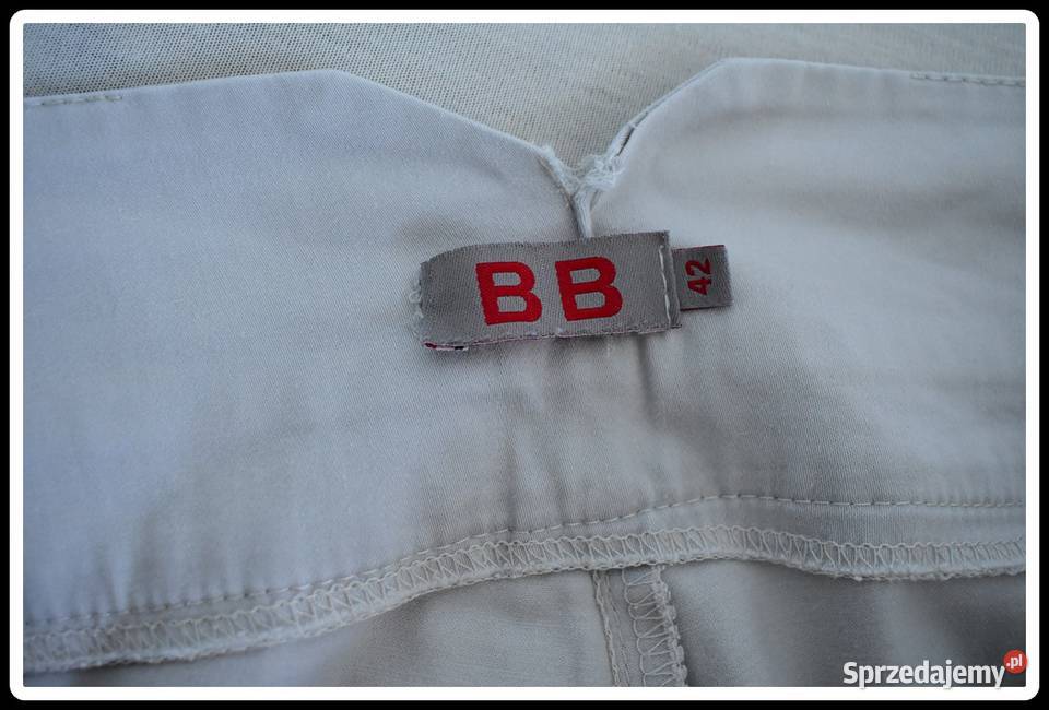 Spodnie damskie materiałowe 42 XL jasno szare Bez wzoru sprzedam