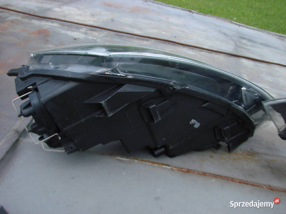 VW Polo 0915 reflektory ORG KPL EU Mielec