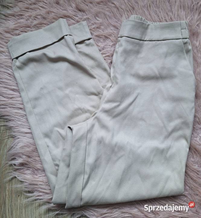 Spodnie materiałowe beżowe Reserved szerokie Reserved Spodnie Kraków