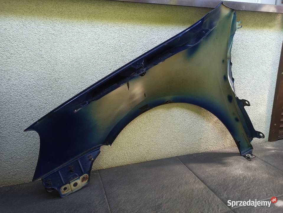 VW Golf V 5 błotnik przedni prawy granatowy LD5Q