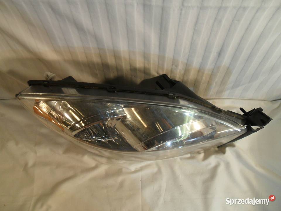 LAMPA PRAWY PRZÓD REFLEKTOR DODGE RAM 1500 2500 osobowe Części samochodowe wielkopolskie Nowy Tomyśl