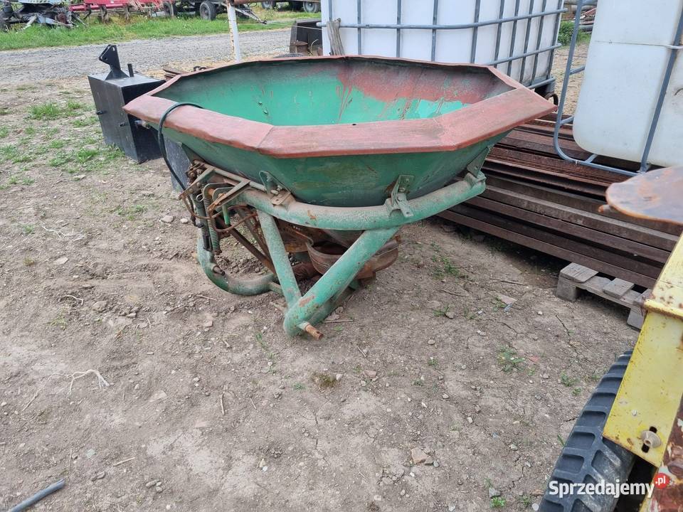 Rozsiewacz Amazone otwierany hydraulicznie