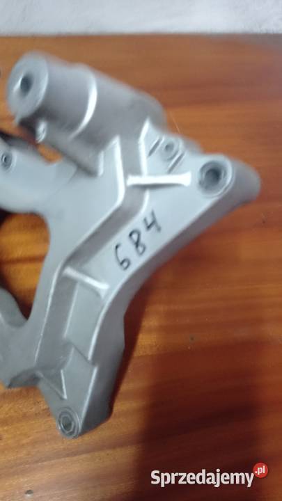 Wspornik koła mocowanie tłumika skuter SYM 250 Łubno