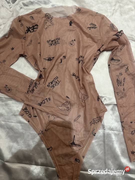 prześwitująca bluzka we wzory