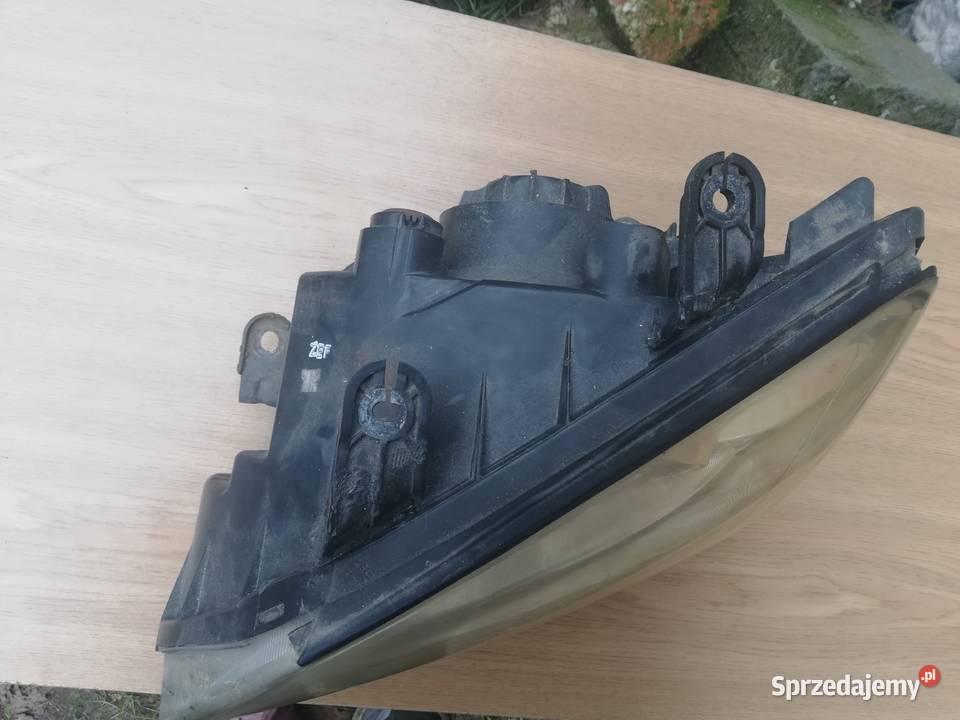 Kia carens ii 2 lampa przód prawa lewa osobowe