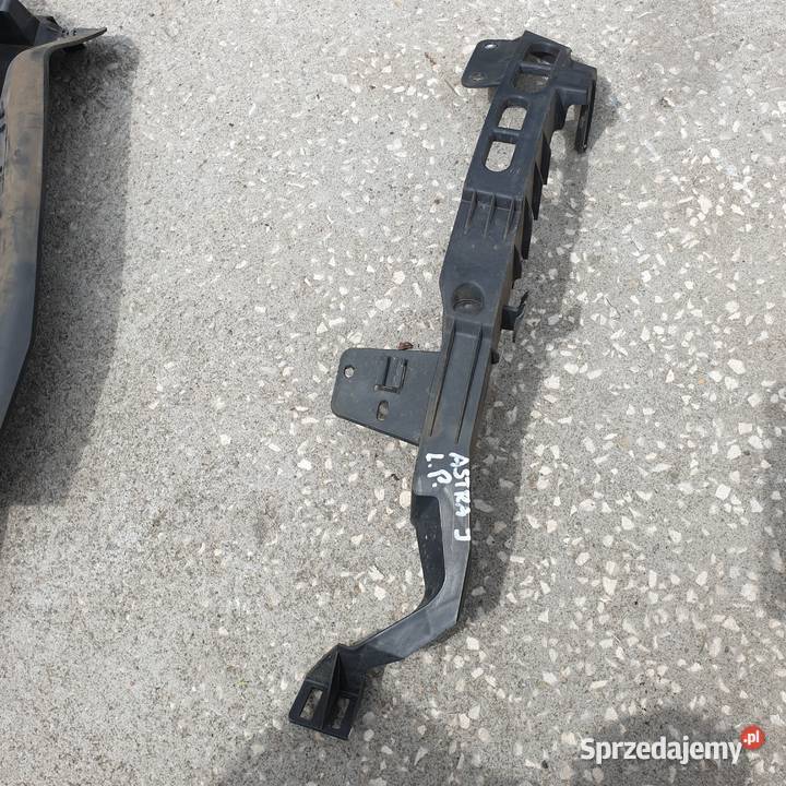 OPEL ASTRA IV J SLIZG ZDERZAKA POD LAMPE LEWY Łochowice