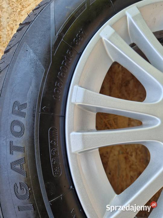 VOLVO FELGI ALUMINIOWE ET44 6Jx15 4X108 OPONY Słowikowo