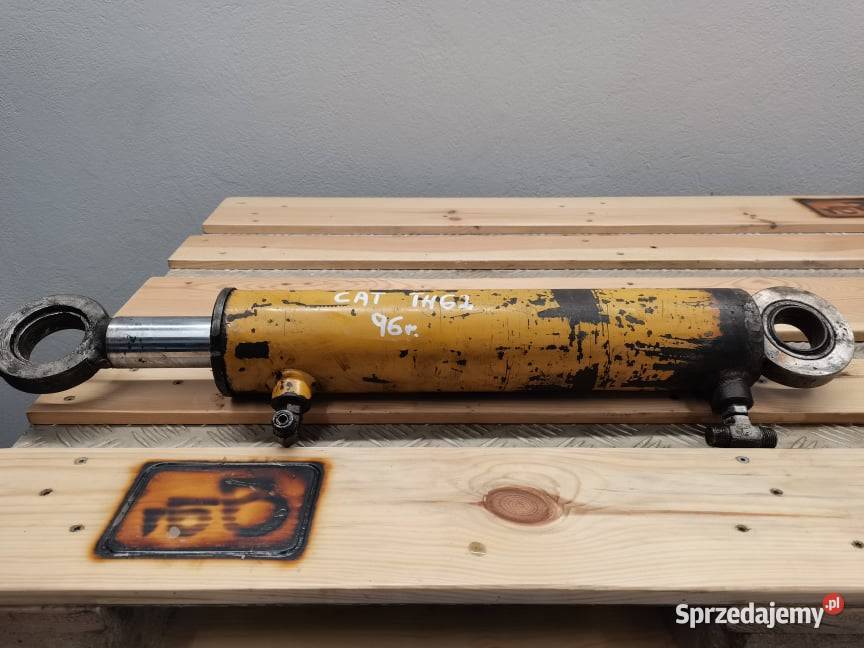 Siłownik poziomowania CAT TH 62 1996r do 1998r Wilkowo