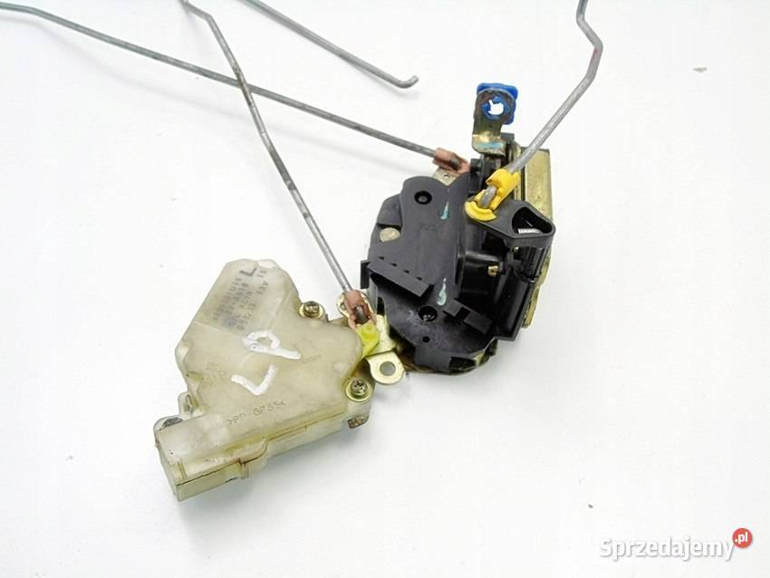 ZAMEK DRZWI LEWY PRZÓD NISSAN ALMERA TINO 2002 osobowe śląskie Sosnowiec