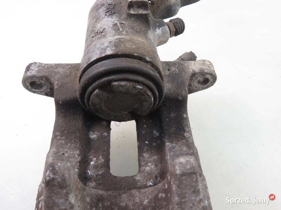 ZACISK PRAWY TYŁ VW GOLF V 1K1 19 TDI BXE