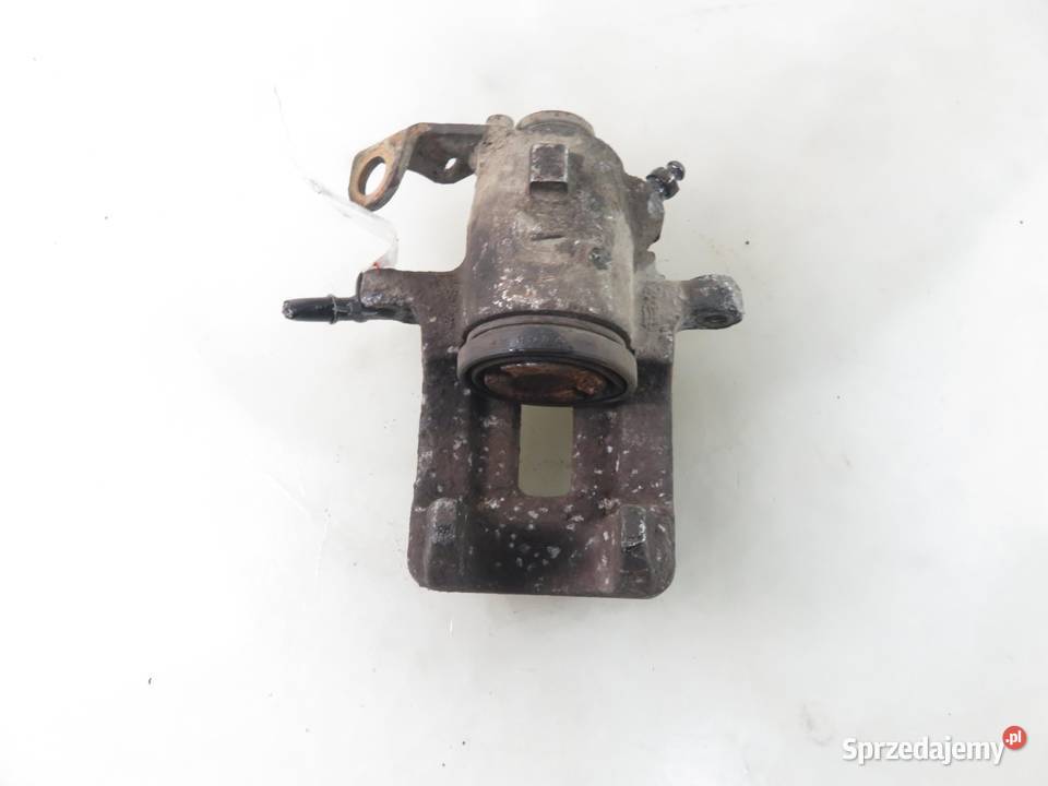 ZACISK LEWY TYŁ VW BORA osobowe