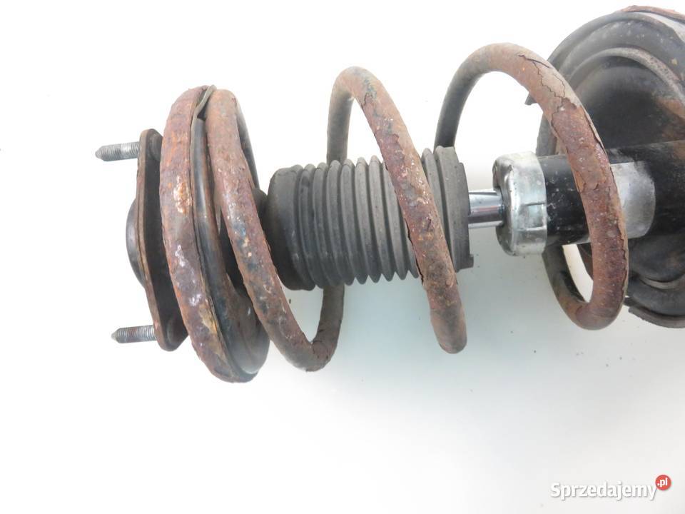 MCPERSON LEWY PRZEDNI MITSUBISHI OUTLANDER II 22 Części samochodowe