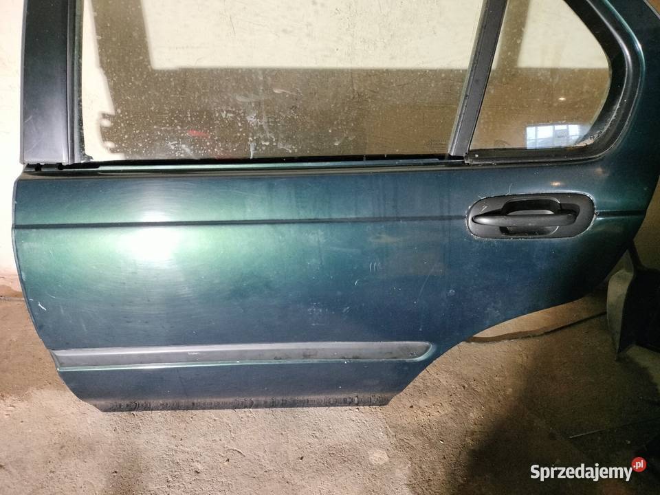 Lewe tylne drzwi 97 r poliftowe ciemnozielone Zbaków Górny