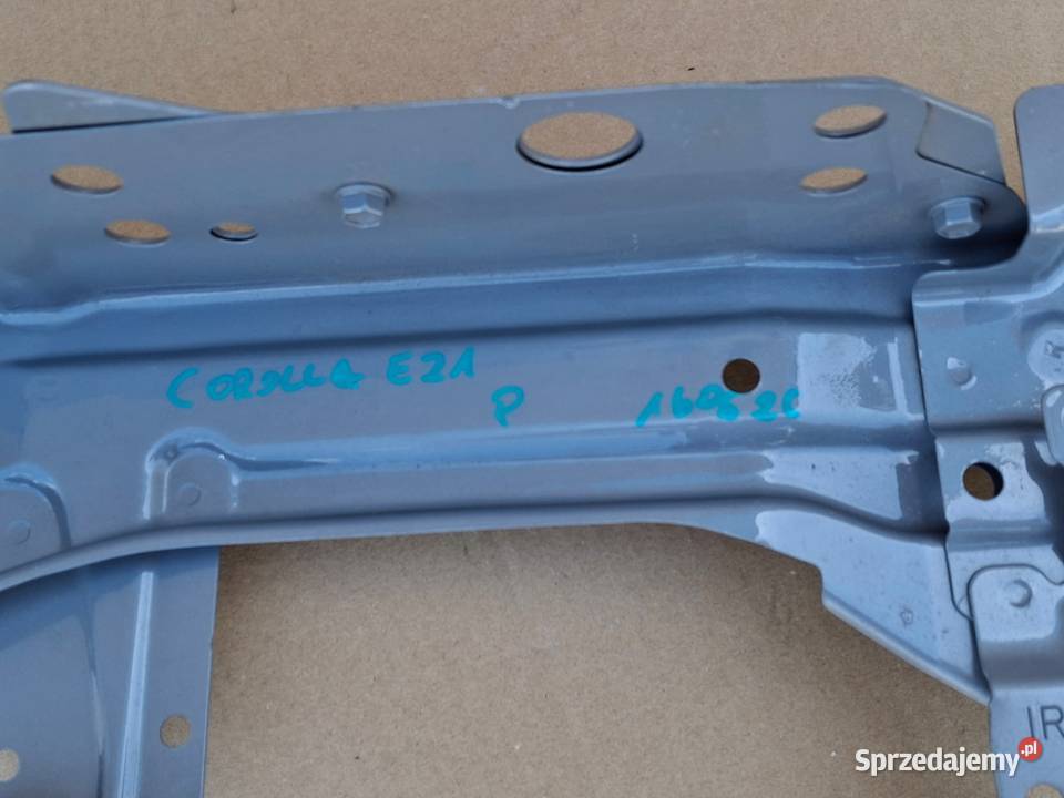 TOYOTA COROLLA E21 WSPORNIK PASA PRZEDNIEGO osobowe Bieleń