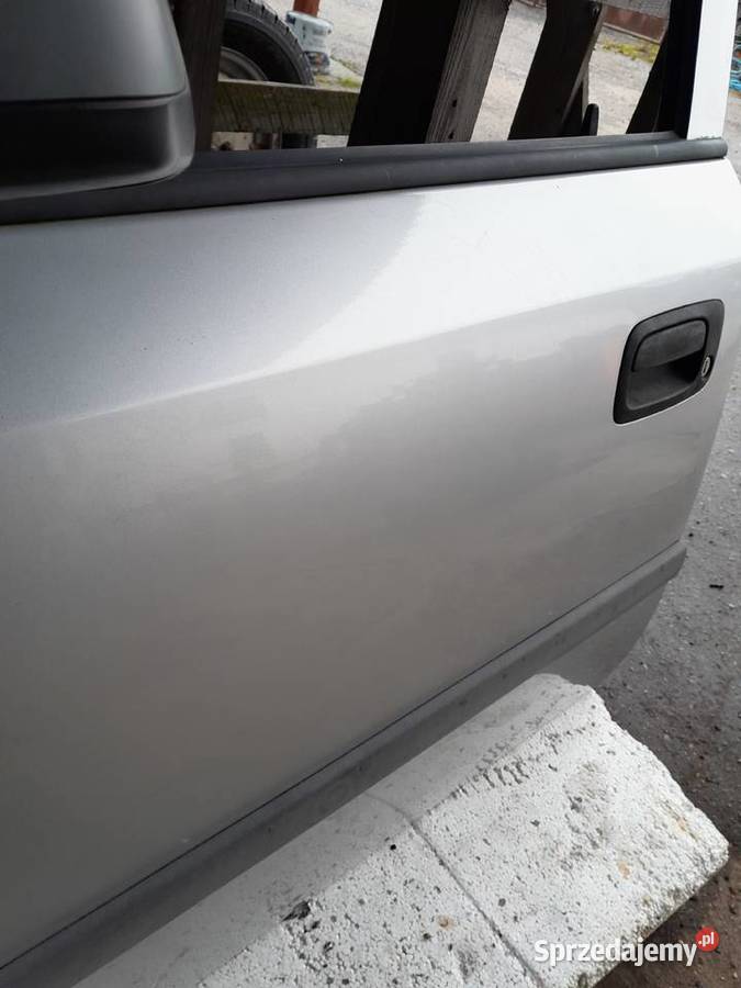 DRZWI LEWE PRZEDNIE OPEL ASTRA G Z147 Drzwi łódzkie Skierniewice