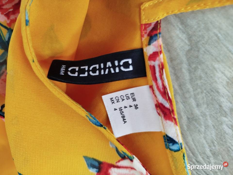 Sprzedam sukienkę Długość Midi Moda i Styl sprzedam